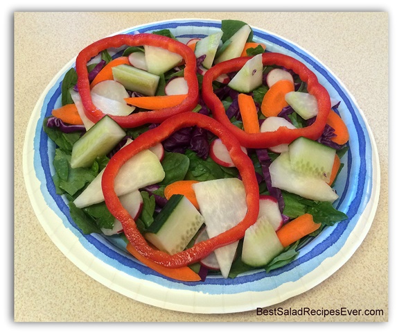 Layer of Red Pepper on Spinach Salad